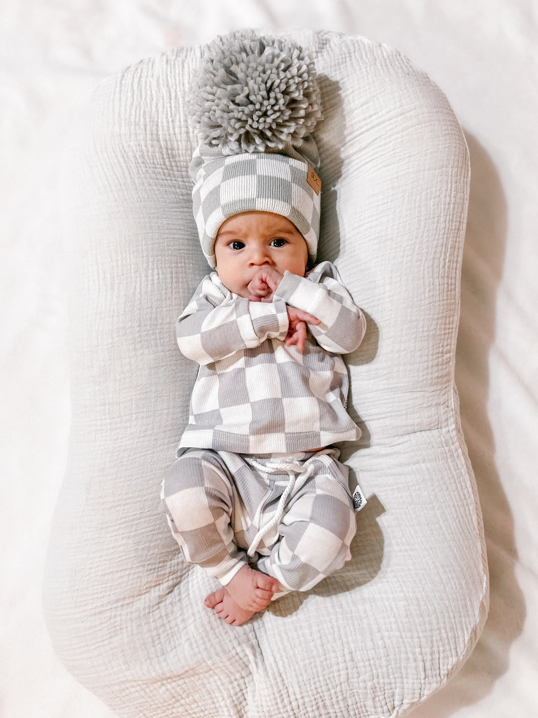 The Newborn Beanie — Pewter + White Checkered